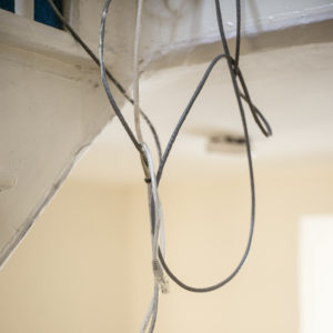 image of wires on the stairs that can not be cleaned up, part of Covid chronicles